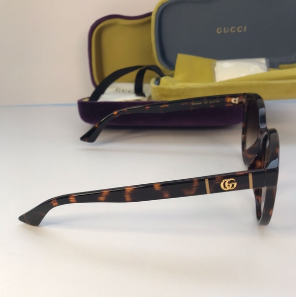 GUCCI GG0636SK 002 round Gucci sunglass comes in a dark havana frame with - Picture 8 of 11